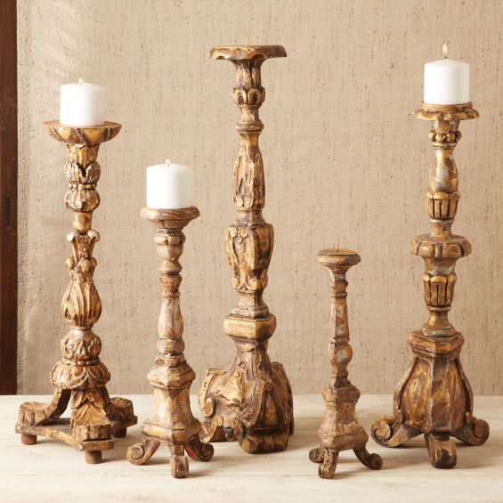 Each candlestick measures from 14" to 24"in height