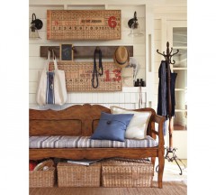 Darby Bench from Pottery Barn has long graceful curves with plenty of storage room underneath.