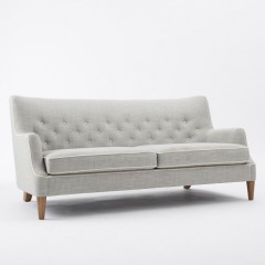 tufted sofa with piping