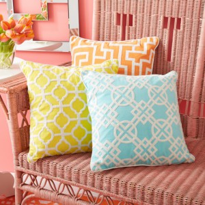 yellow, orange and aqua crewel pillows